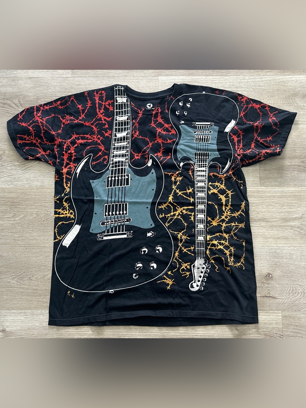 Liquid Blue "Guitars & Barbed Wire" Graphic All-Over-Print T-Shirt XL